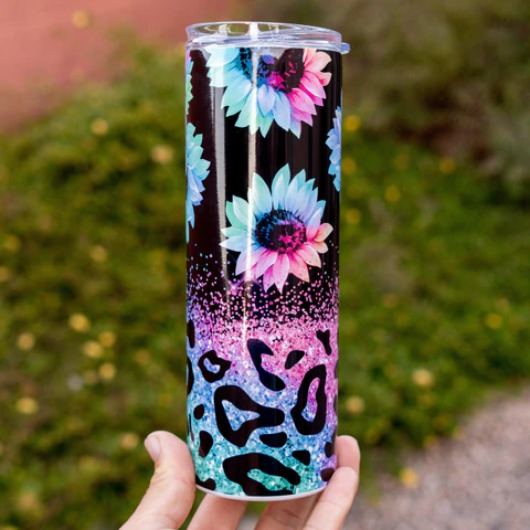 A sublimated tumbler with a full-wrap printed design